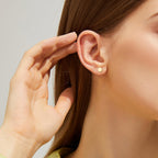 Calf: Minimalist gold stud earrings