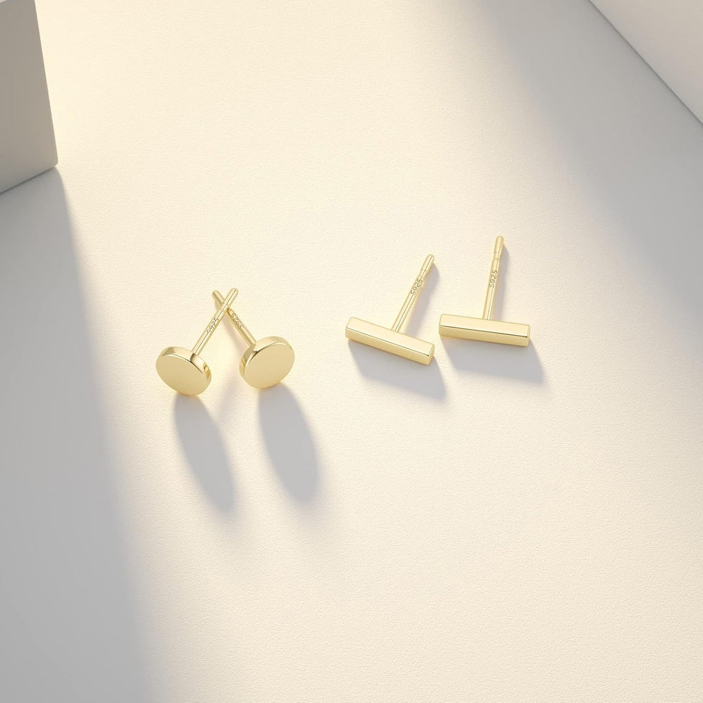 Calf: Minimalist gold stud earrings