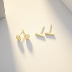 Calf: Minimalist gold stud earrings