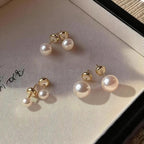 Calf: Pearl stud earrings